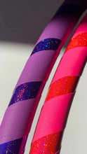 Load image into Gallery viewer, two hula hoops with glitter and grip tape in pink and purple