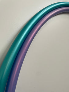 teal and purple hula hoops nesting