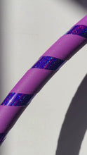 Load and play video in Gallery viewer, close up of glitter hula hoop with purple grip tape
